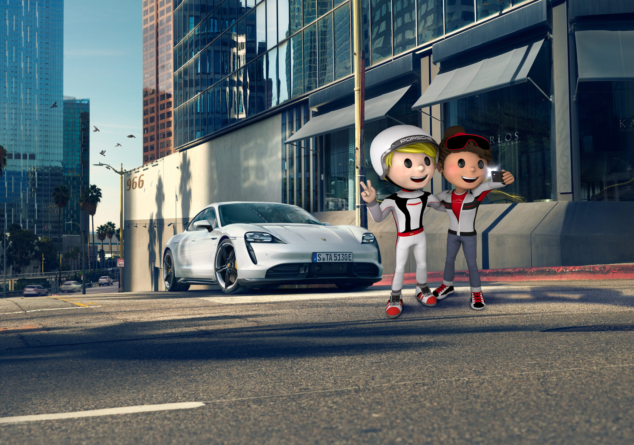 A white Porsche Taycan parked on a sunny city street with two animated Porsche mascots posing for a selfie in front of the car.